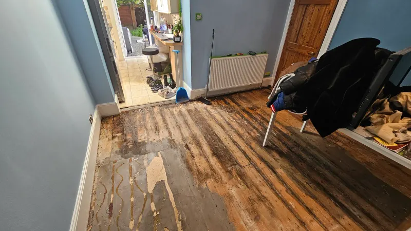 Before: Post-Flood Structural Floor Repair & Room Restoration