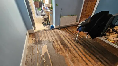 Before: Post-Flood Structural Floor Repair & Room Restoration